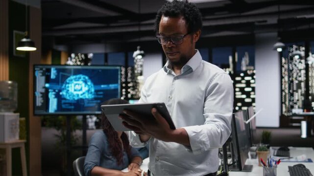 Portrait of smiling engineer in office working to fix bugs in artificial intelligence system. Happy IT worker troubleshooting neural network errors in tech agency workplace for coding workflows.