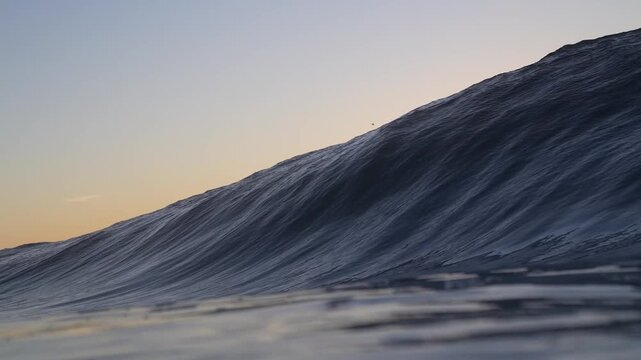Low Angle View of Deep Blue Ocean Swell and Powerful ea Wave Crest