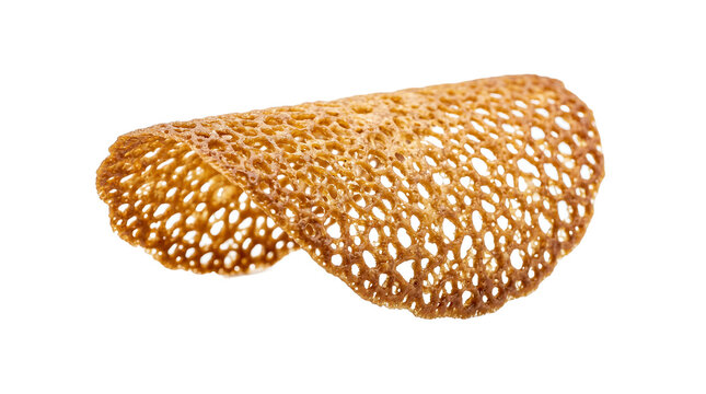 Crispy wafer tuile displays a unique porous surface texture folded into a gentle arc.