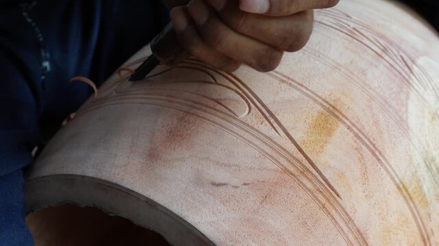 Traditional wood carving craft creating detailed timber artwork