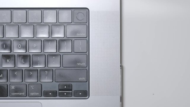 Left right used laptop keyboard showcasing everyday digital work