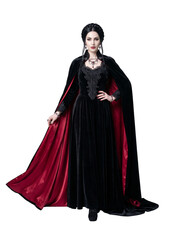 Naklejka premium Isolated full body front view of an elegant Caucasian female vampire standing with a hand on her hip in a black and red velvet gown for Halloween dress up
