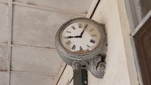 Broken clock in former train station, Inhambane Province, Inhambane, Mozambique