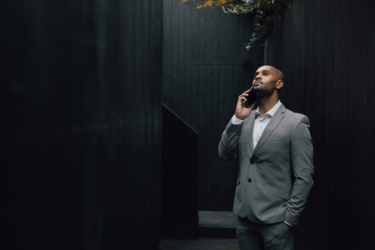 Man in Suit Maintaining Eye Contact in Discussion