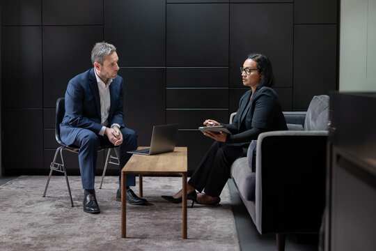 Business meeting in modern office setting