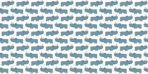 Funny rhinoceros repeating pattern. rhino seamless pattern for nursery wallpaper © rymarenko