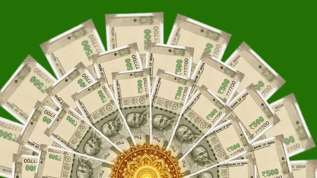 Indian 500 rupee cash bills arranged in a rotating semi-circular fan pattern with a traditional golden mandala design on a chroma key green screen.
