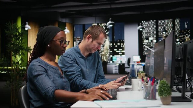 Engineering team typing complex code on computer, developing machine learning models to automate business tasks in workspace. Teamworking colleagues write programming language scripts on PC.
