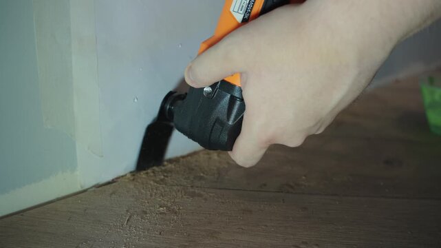Oscillating Multi Tool Cutting Baseboard Trim