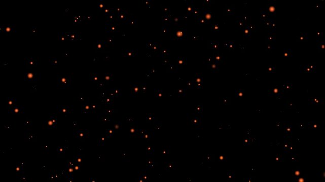 Gold dust. 4K abstract motion background of glimmering, glittering gold particles slowly floating against a liquid gold backdrop.