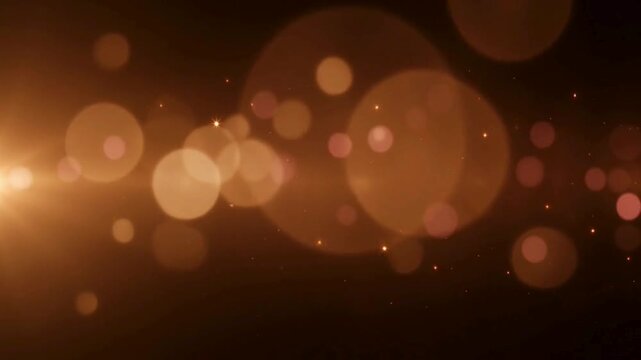 glowing golden bokeh lights and tiny sparkling particles 