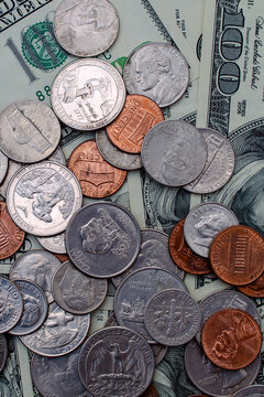 Financial growth and economic stability US dollar bills and coins wealth investment and personal finance.
