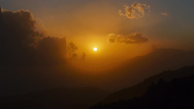 Time lapse of a sunset into wispy clouds over Los Angeles filmed from Rim of the World Highway, near Lake Arrowhead, San Bernardino Mountains, California.