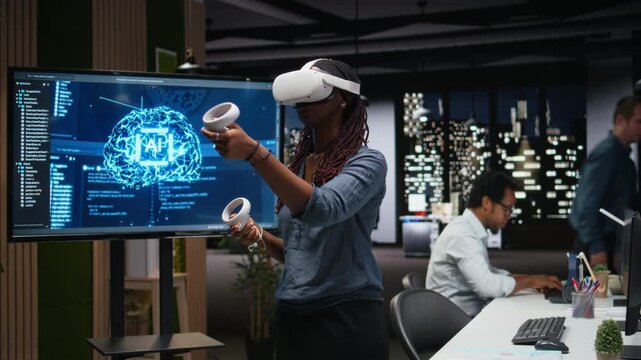 Technician in office using VR headset gear to fix bugs in artificial intelligence system. Worker troubleshooting neural network errors with virtual reality equipment in tech agency workplace.