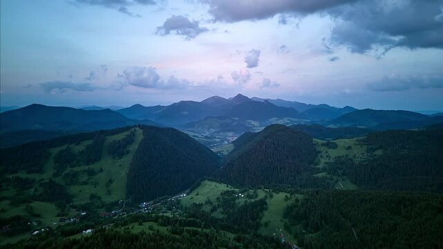 Aerial Arc Hyperlapse Over Fatra Mountains and Valley Village at Blue Hour