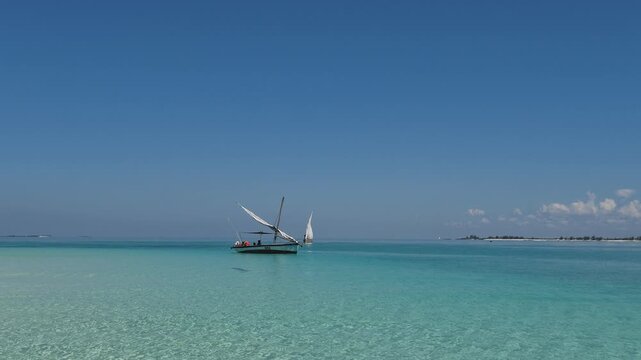 Dhow on turquoise water, Nampula Province, Island of Mozambique, Mozambique