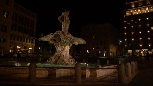 Fontana del Tritone Fountain Illuminated in Piazza Barberini at Night Rome Italy Shot with Cinema Camera