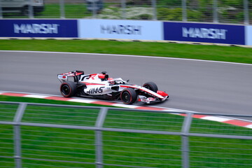 Obraz premium May 24, 2026, Montreal, Canada - Haas Formula 1 car on track by Ocon and Bearman at Circuit Gilles Villeneuve. g.