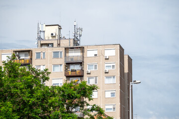 Fototapeta premium Telecommunication Antennas On Apartment Rooftop