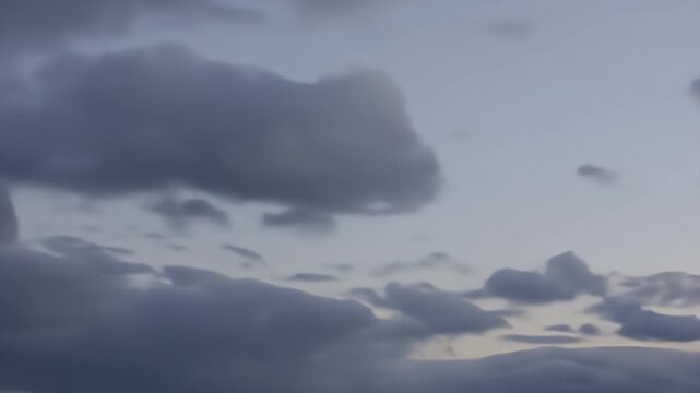 Dark, ominous storm clouds gather overhead, hinting at impending rain.