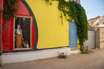Fototapeta premium Building painted in a colorful pattern in the village of Erriadh, Djerba, Tunisia