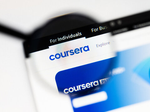 Milan, Italy 2026, 20 Apr Closeup of Coursera website on a laptop screen. Coursera logo under a magnifying glass.