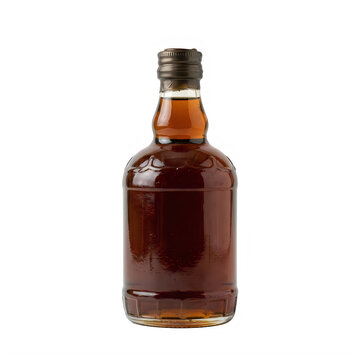 A single glass bottle filled with dark brown whiskey or rum liquor drink on a simple surface for display isolated on transparent background