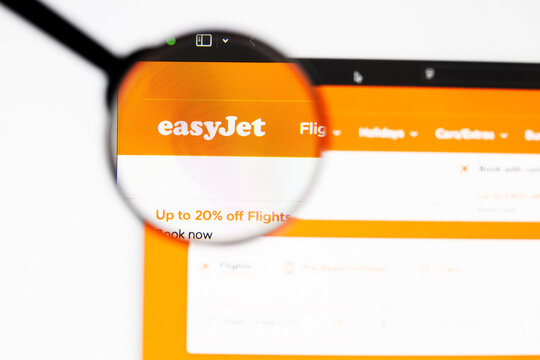 Milan, Italy 2026, 20 Apr Closeup of easyjet website on a laptop screen. easyjet logo under a magnifying glass.