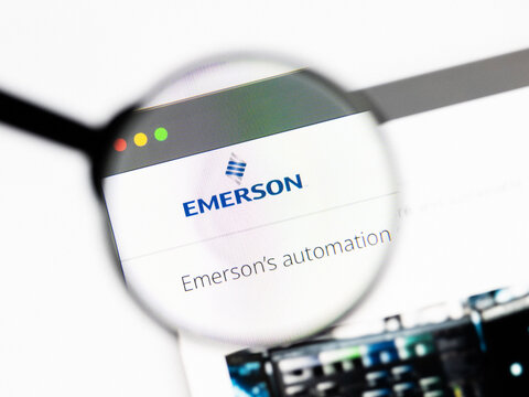 Milan, Italy 2026, 20 Apr Closeup of Emerson Electric website on a laptop screen. Emerson Electric logo under a magnifying glass.