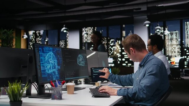 Software developer in office analyzing machine learning to prevent AI errors. Startup IT expert reviewing code logic to improve AI prediction accuracy.