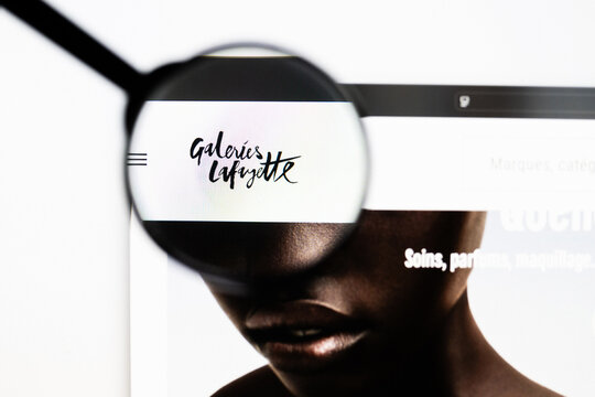 Milan, Italy 2026, 20 Apr Closeup of Galeries Lafayette website on a laptop screen. Galeries Lafayette logo under a magnifying glass.