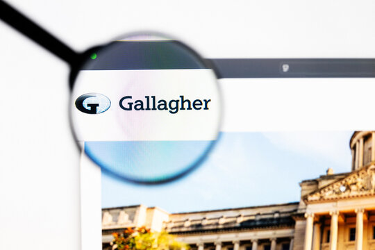 Milan, Italy 2026, 20 Apr Closeup of Gallagher website on a laptop screen. Gallagher logo under a magnifying glass.