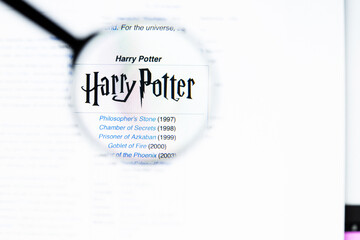 Naklejka premium Milan, Italy 2026, 20 Apr Closeup of Harry Potter Wikipedia page on a laptop screen. Harry Potter name under a magnifying glass.