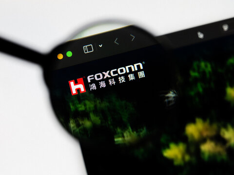Milan, Italy 2026, 20 Apr Closeup of Hon Hai Precision FOXCONN website on a laptop screen. Hon Hai Precision FOXCONN logo under a magnifying glass.