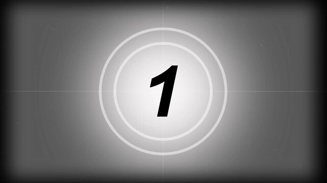 Vintage old projected film head leader with real time 5-0 countdown clock, worn damaged style with scratches marks and grain for classic movie opening visuals
