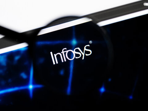Milan, Italy 2026, 20 Apr Closeup of Infosys website on a laptop screen. Infosys logo under a magnifying glass.