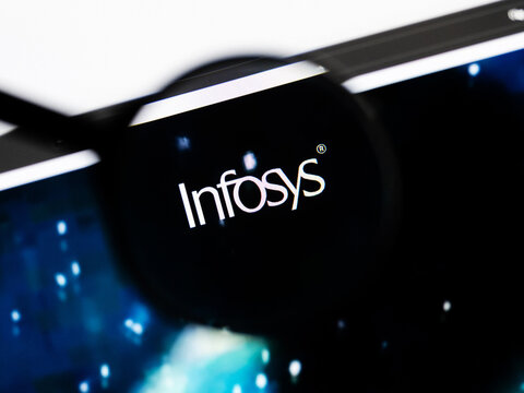 Milan, Italy 2026, 20 Apr Closeup of Infosys website on a laptop screen. Infosys logo under a magnifying glass.