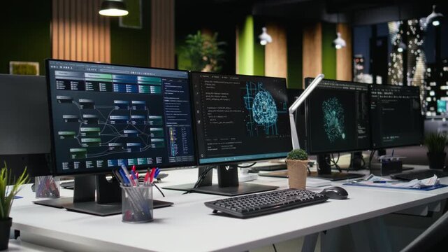 Computers in empty office used to implement machine learning to prevent AI errors. PC monitors in tech agency with software used to review code and improve AI.