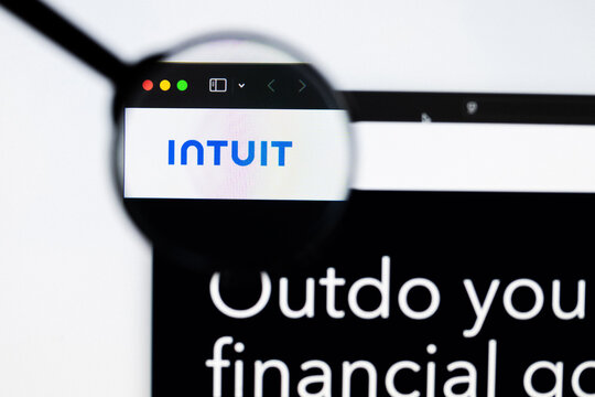 Milan, Italy 2026, 20 Apr Closeup of Intuit website on a laptop screen. Intuit logo under a magnifying glass.