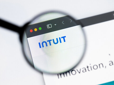 Milan, Italy 2026, 20 Apr Closeup of Intuit website on a laptop screen. Intuit logo under a magnifying glass.