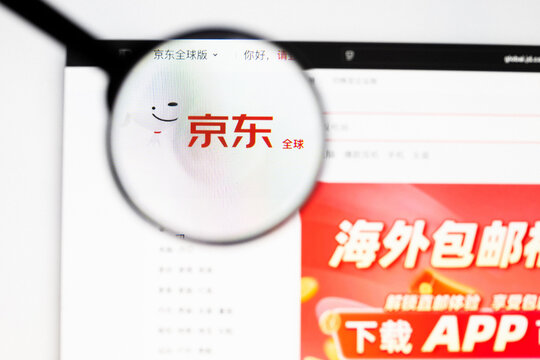 Milan, Italy 2026, 20 Apr Closeup of JD.com website on a laptop screen. JD.com logo under a magnifying glass.