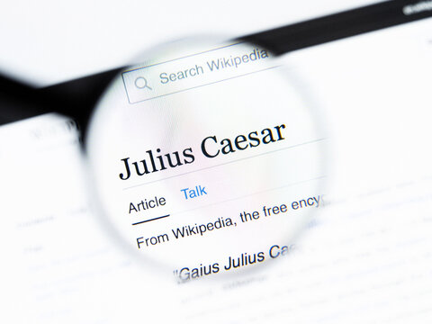Milan, Italy 2026, 20 Apr Closeup of Julius Caesar Wikipedia page on a laptop screen. Julius Caesar name under a magnifying glass.