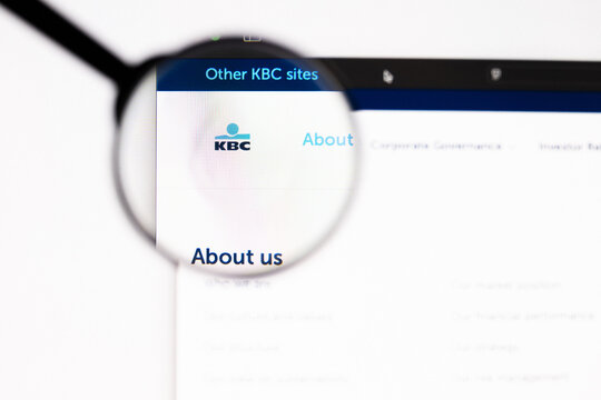 Milan, Italy 2026, 20 Apr Closeup of KBC Group website on a laptop screen. KBC Group logo under a magnifying glass.