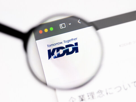 Milan, Italy 2026, 20 Apr Closeup of KDDI website on a laptop screen. KDDI logo under a magnifying glass.