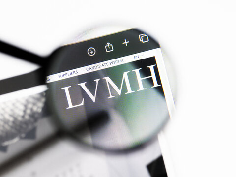 Milan, Italy 2026, 20 Apr Closeup of LVMH Louis Vuitton Moet Hennessy website on a laptop screen. LVMH Louis Vuitton Moet Hennessy logo under a magnifying glass.