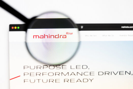 Milan, Italy 2026, 20 Apr Closeup of Mahindra & Mahindra website on a laptop screen. Mahindra & Mahindra logo under a magnifying glass.