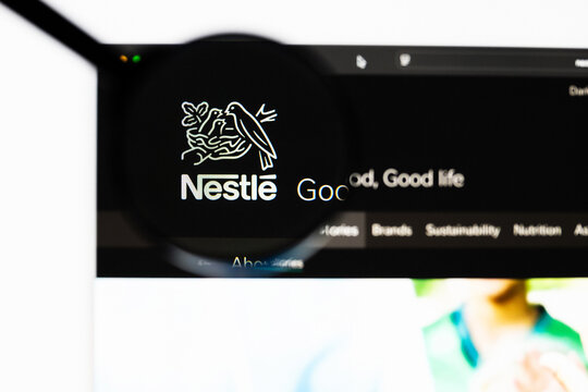 Milan, Italy 2026, 20 Apr Closeup of Nestl&eacute; website on a laptop screen. Nestl&eacute; logo under a magnifying glass.