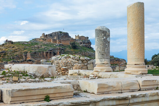 Acropolis, temple of Kronos of ancient Greek city Tlos in Lycia located on Lycian way. Famous historical site In Antalya region. Popular place for family travel on summer vacation. Fethiye, Turkey