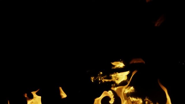 Captivating Flames Dancing in the Dark a Fiery Spectacle.