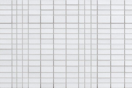a white brick wall with a black border